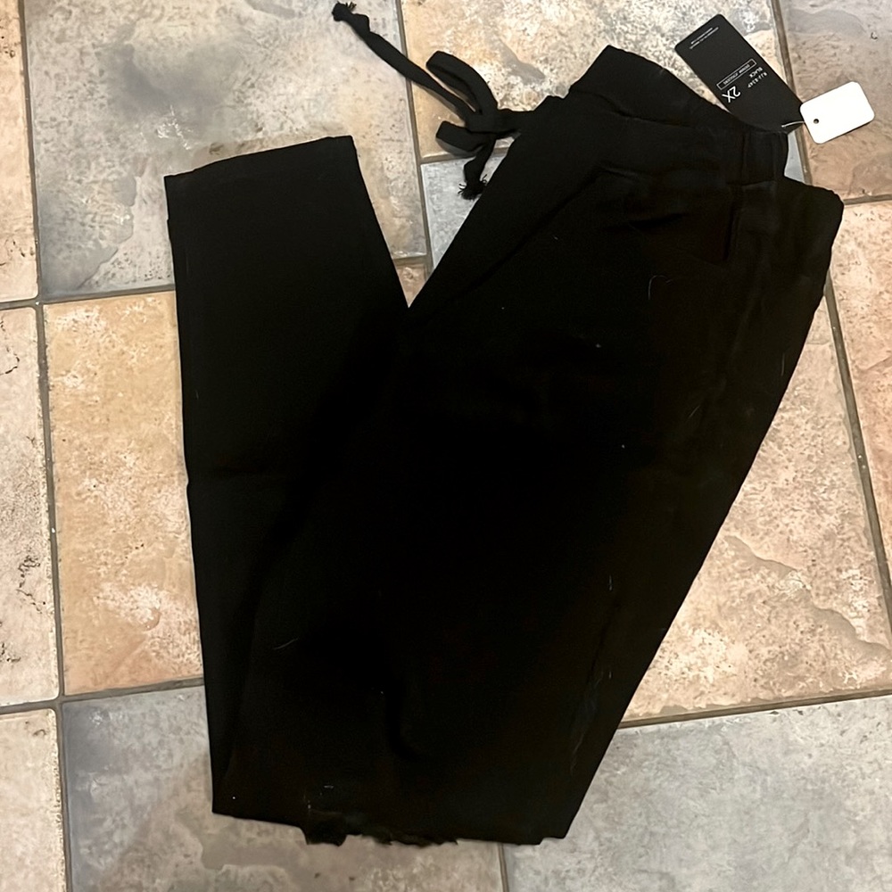 Black distressed denim joggers